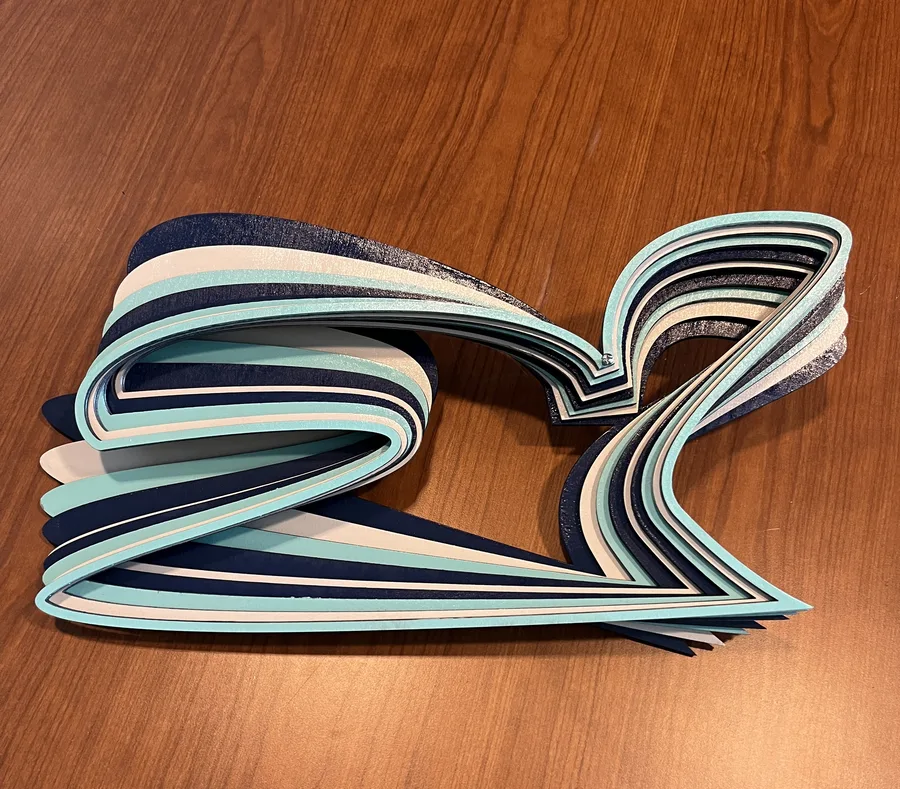 Undertow — layered wood sculpture